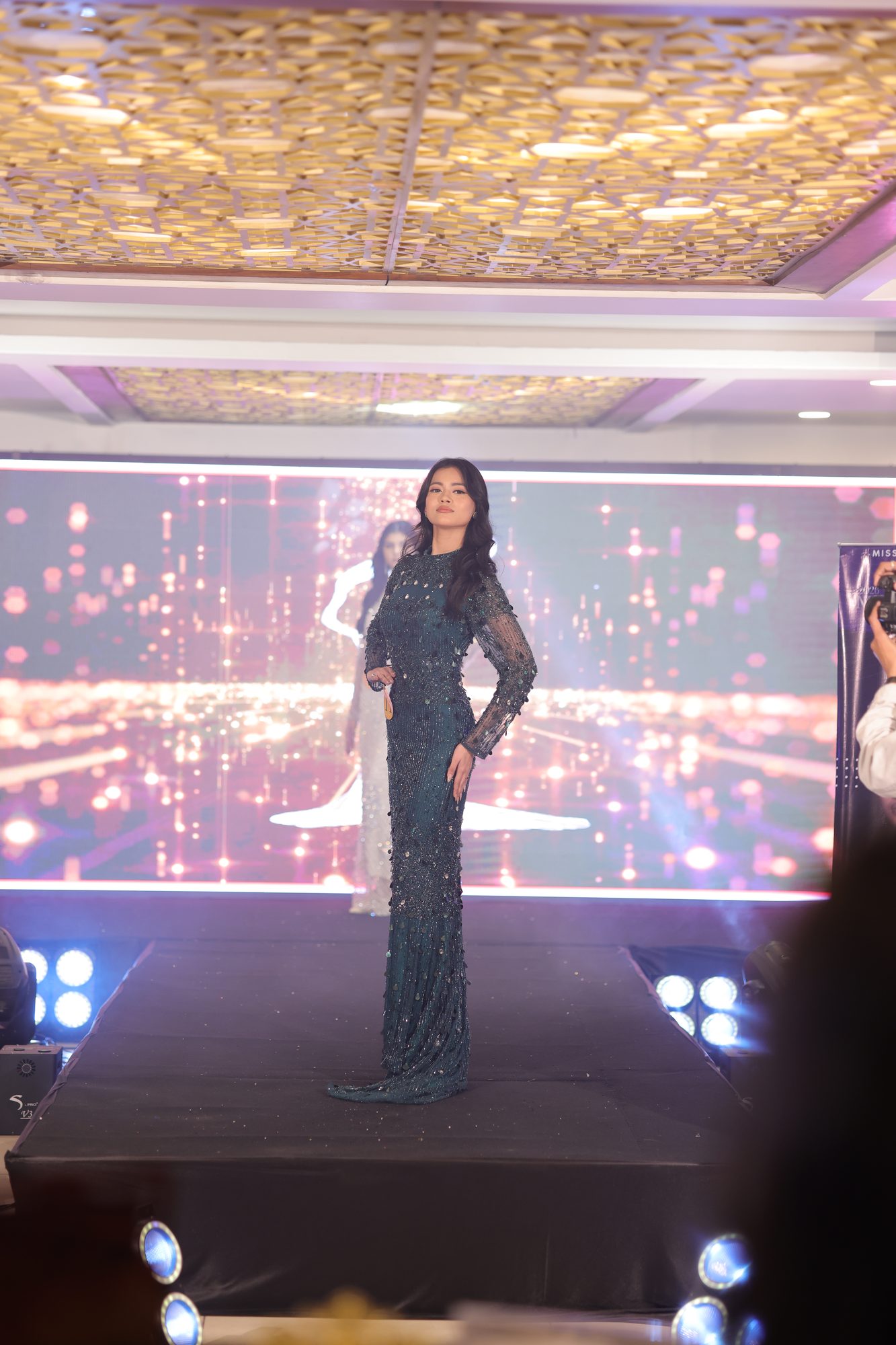Contestant in Teal Gown